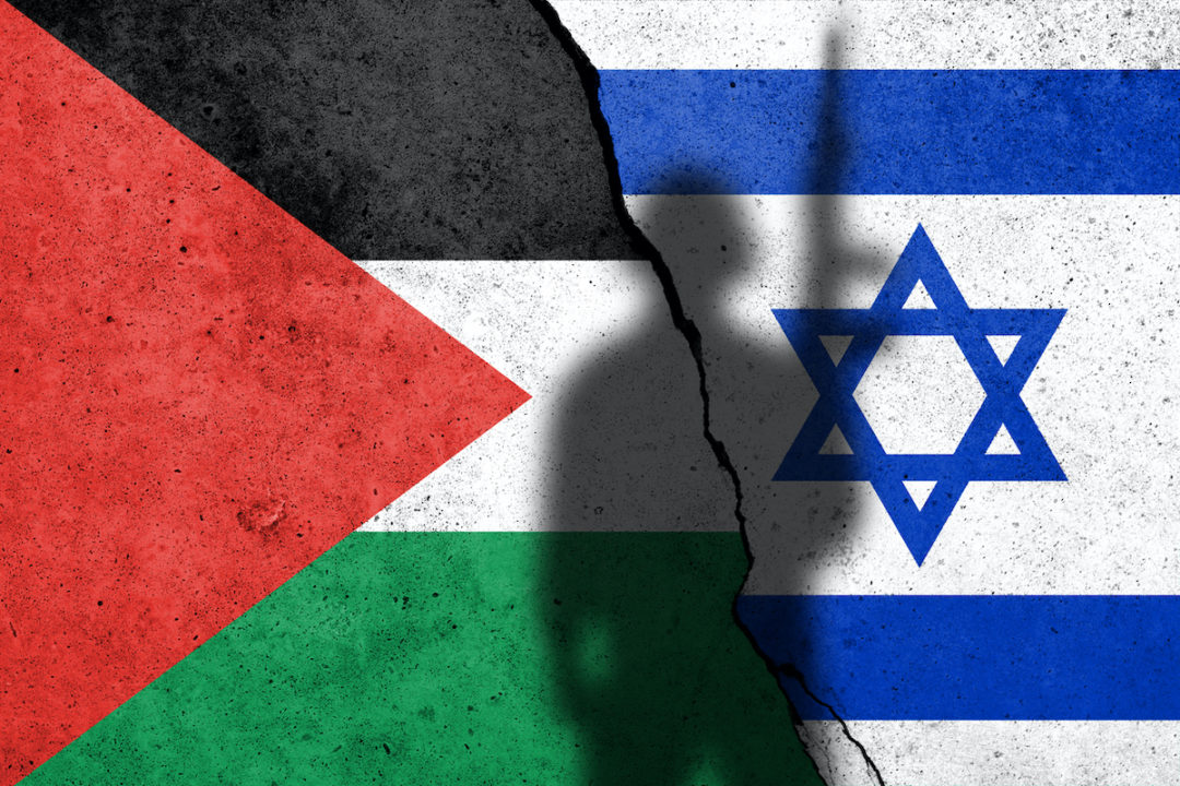 flags of israel and palestine with shaddow of war